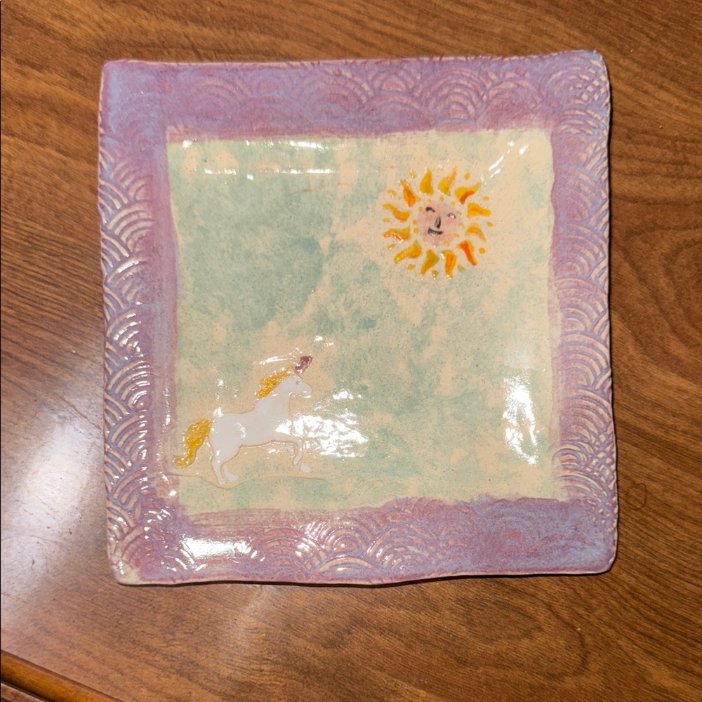 Purple and Green Ceramic Plate with Unicorn and Sun Design